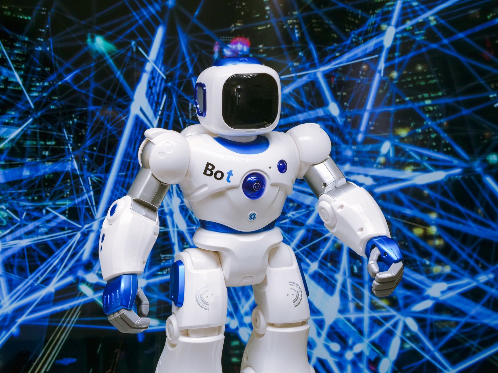 Advanced humanoid robot with glowing blue accents in a digital network setting — UPI Study