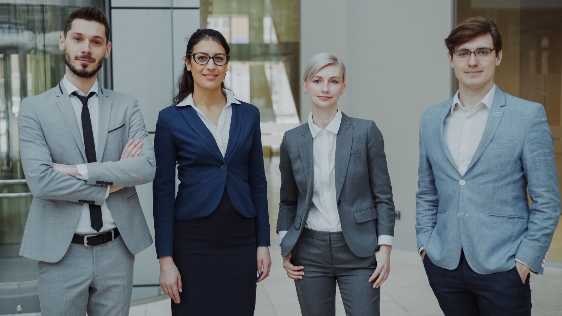 Diverse group of business professionals in an office setting representing corporate teamwork — UPI Study
