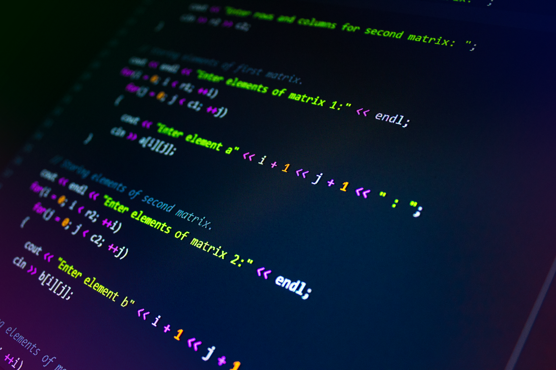 Close-up of colorful programming code displayed on a monitor screen — UPI Study