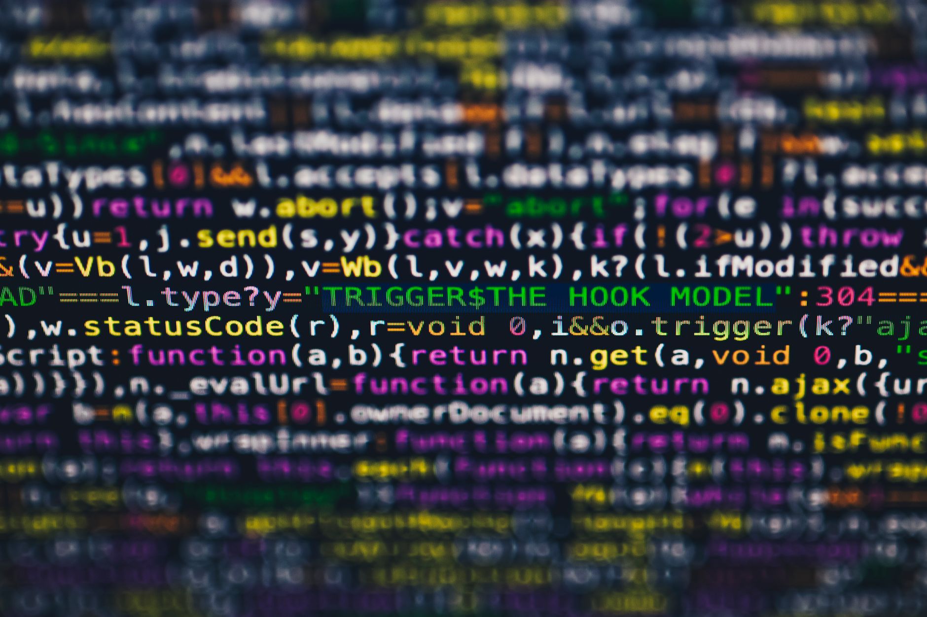 Vibrant close-up of multicolor programming code lines displayed on a screen — UPI Study