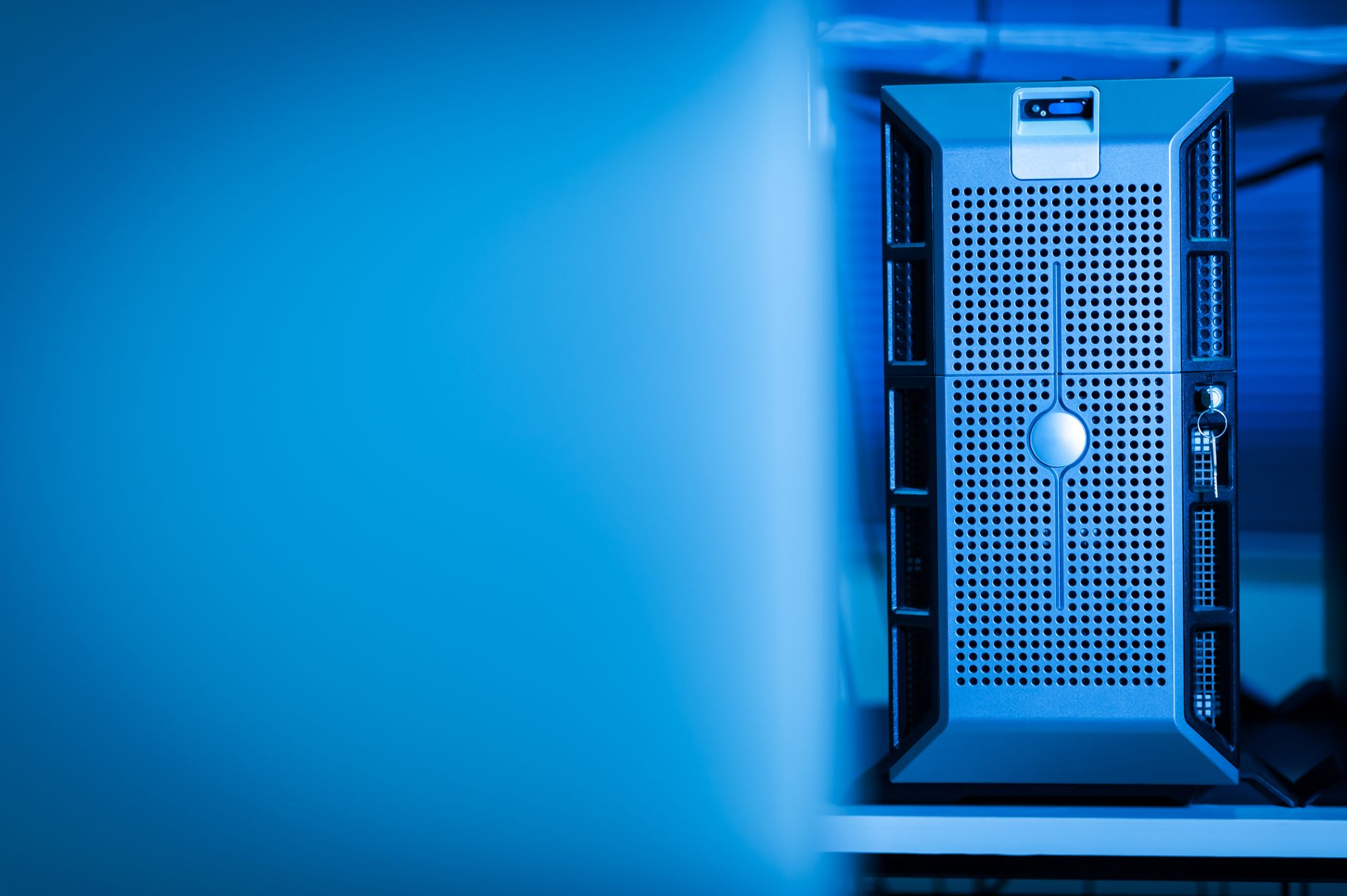 Close-up of a modern server unit in a blue-lit data center environment — UPI Study