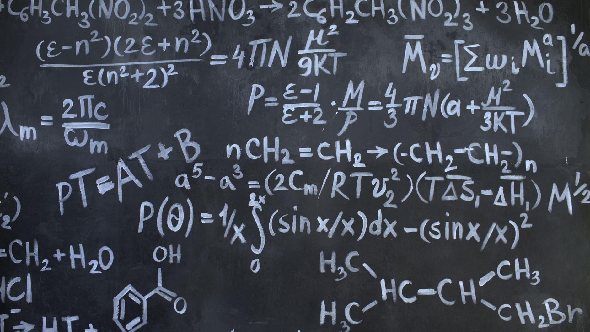 Intricate mathematical and chemical equations chalked on a blackboard symbolizing education and science — UPI Study