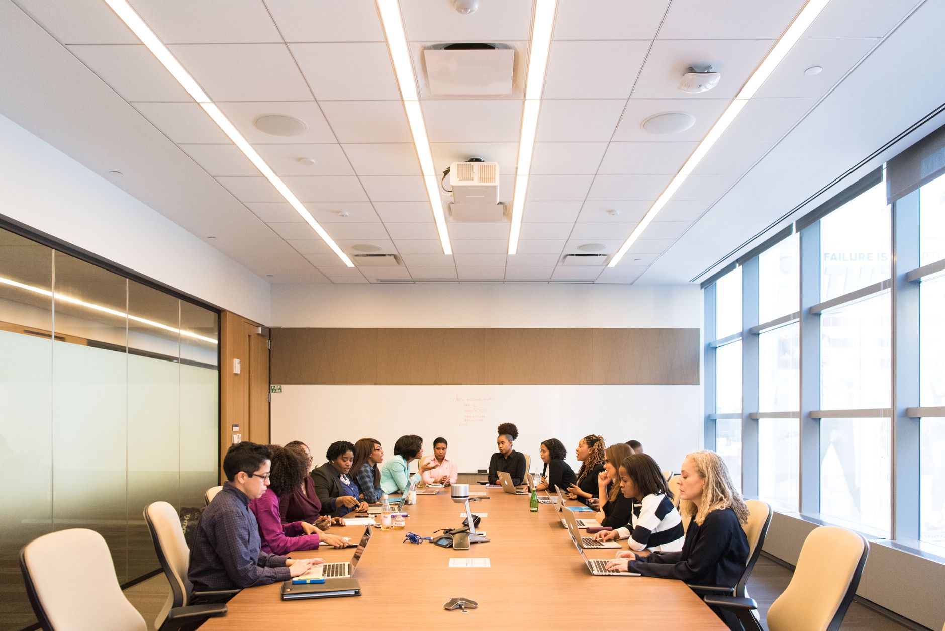 A multicultural team brainstorming and collaborating during a business meeting — UPI Study