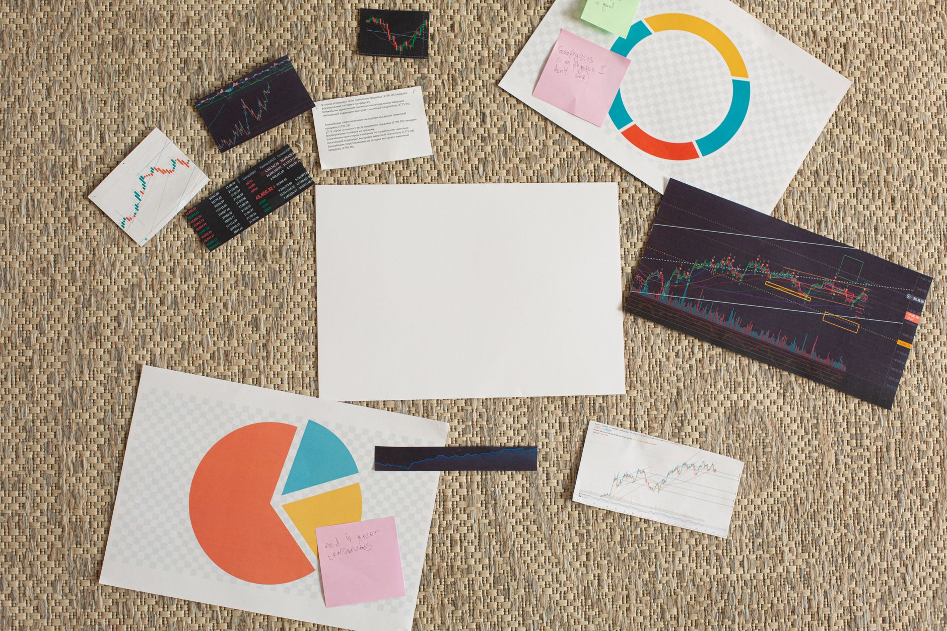 Flat lay of financial charts and sticky notes on a textured surface, ideal for planning and analysis concepts — UPI Study