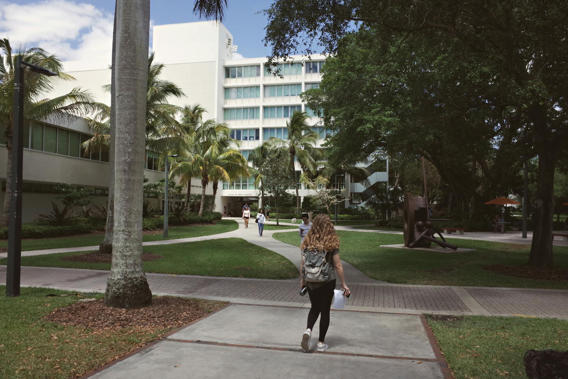 A vibrant university campus scene in Coral Gables, Florida showcasing college life on a sunny day — UPI Study