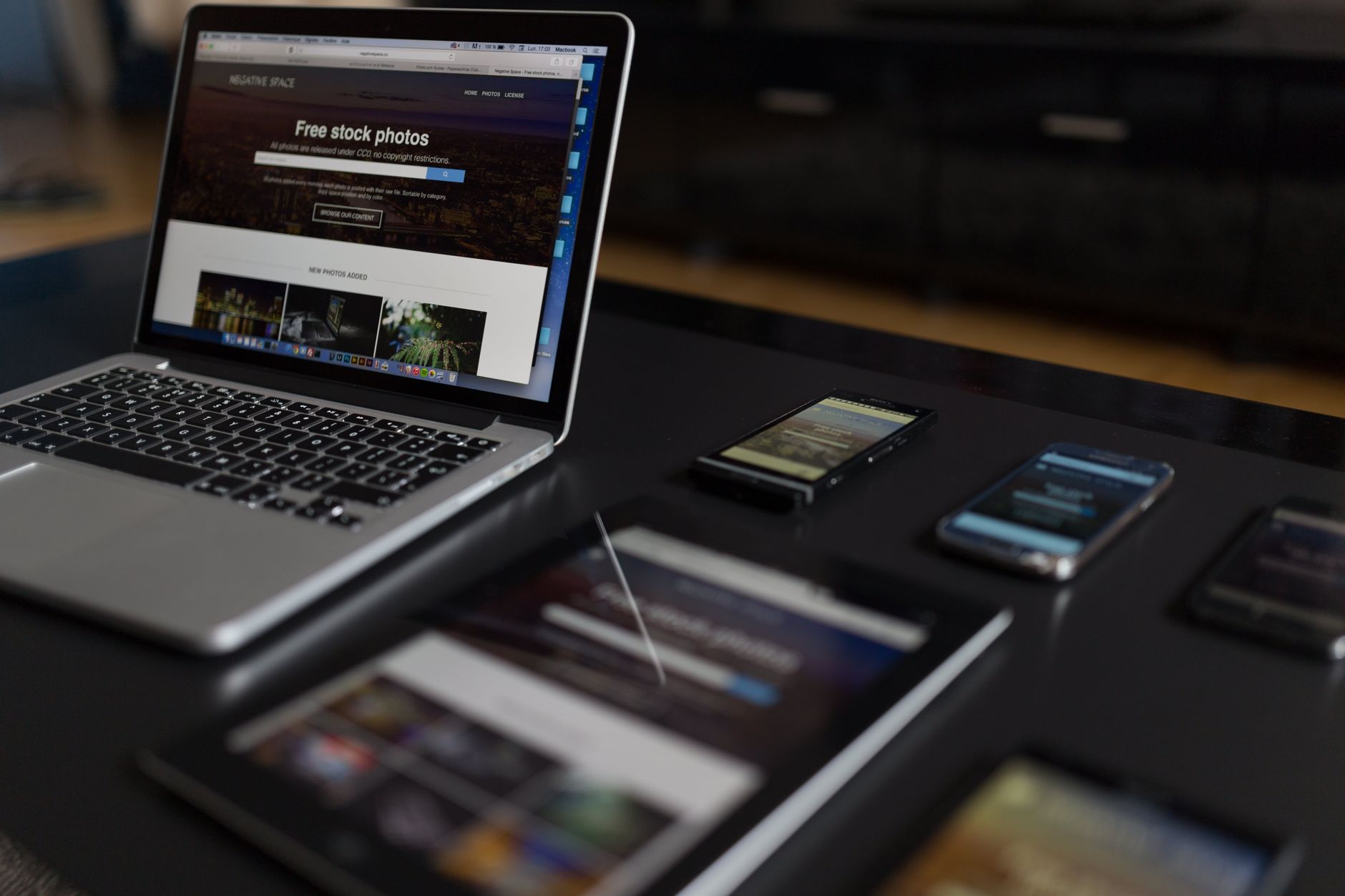 A contemporary workspace showcasing a laptop, tablet, and smartphones, ideal for tech and freelance use — UPI Study