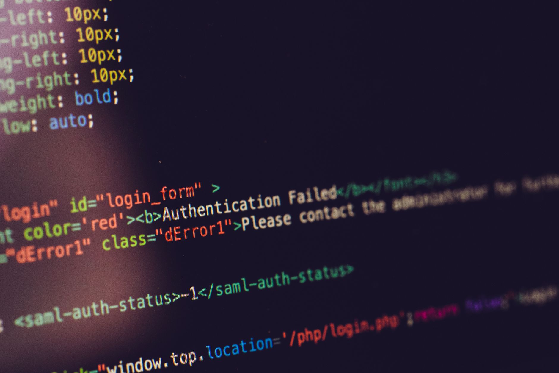 Close view of computer screen displaying HTML code with an authentication error — UPI Study