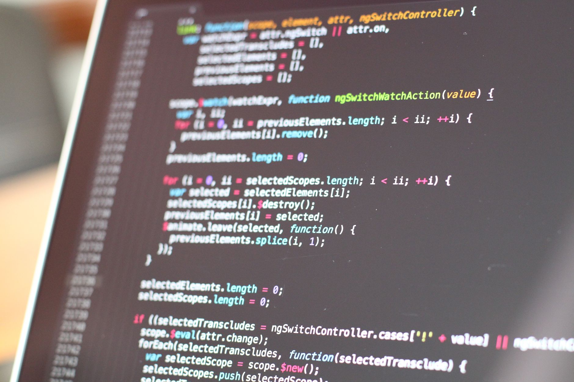 Close-up view of colorful code on a laptop screen, showcasing programming concepts — UPI Study