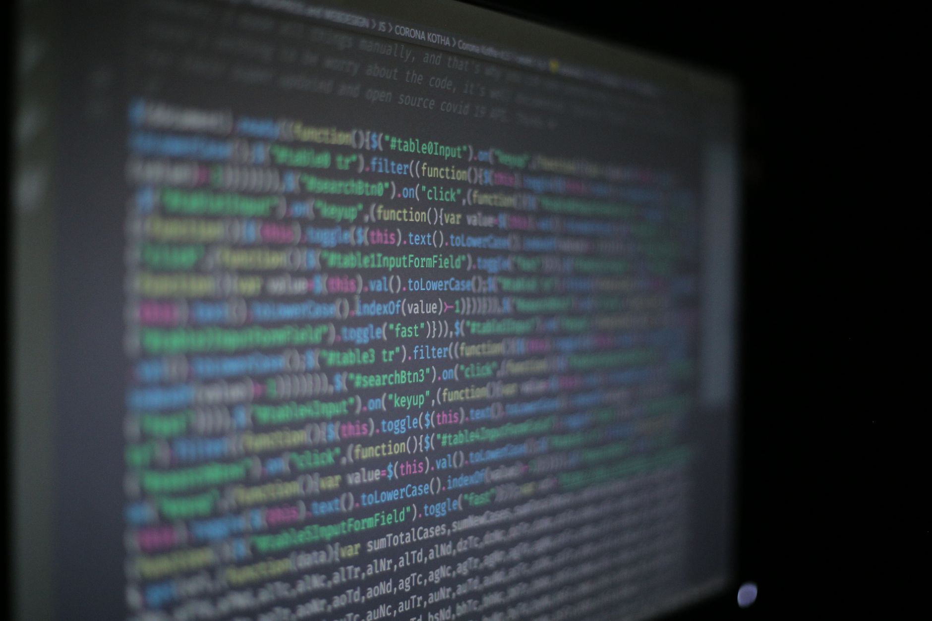 Close-up of colorful programming code on a blurred computer monitor — UPI Study