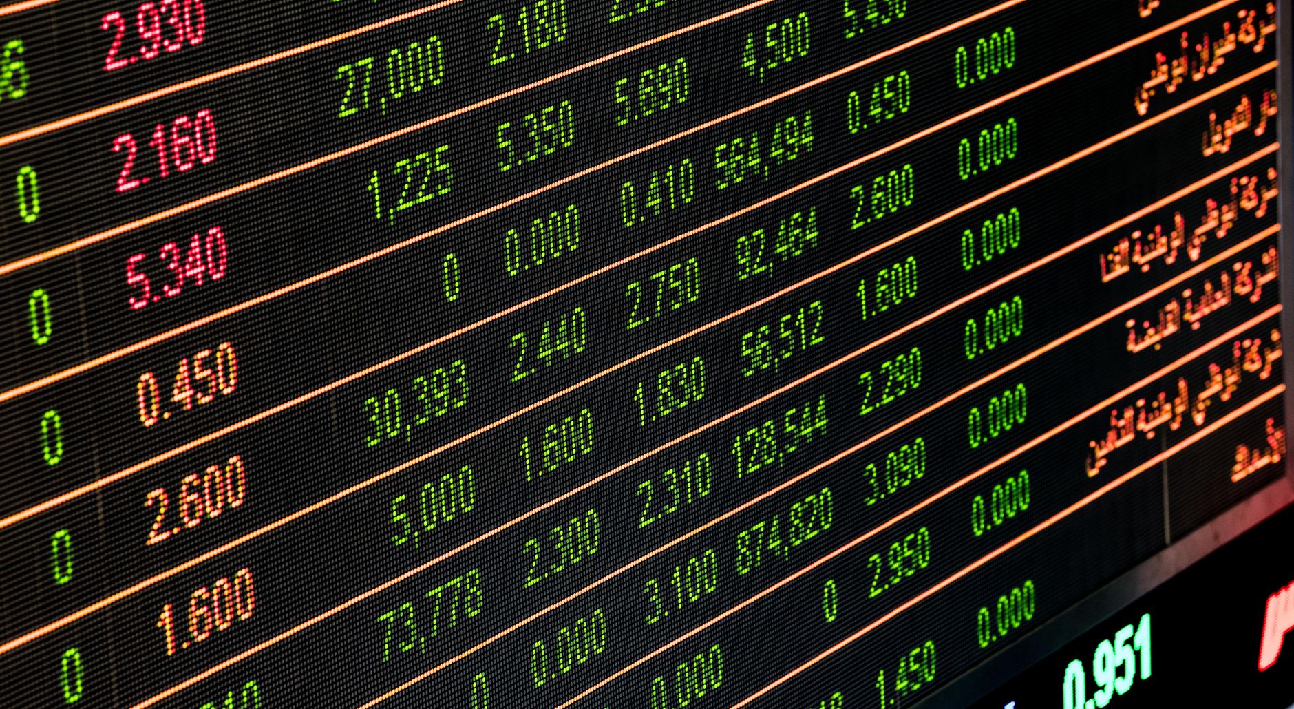 Detailed view of a stock market screen showing numbers and data, symbolizing financial trading — UPI Study