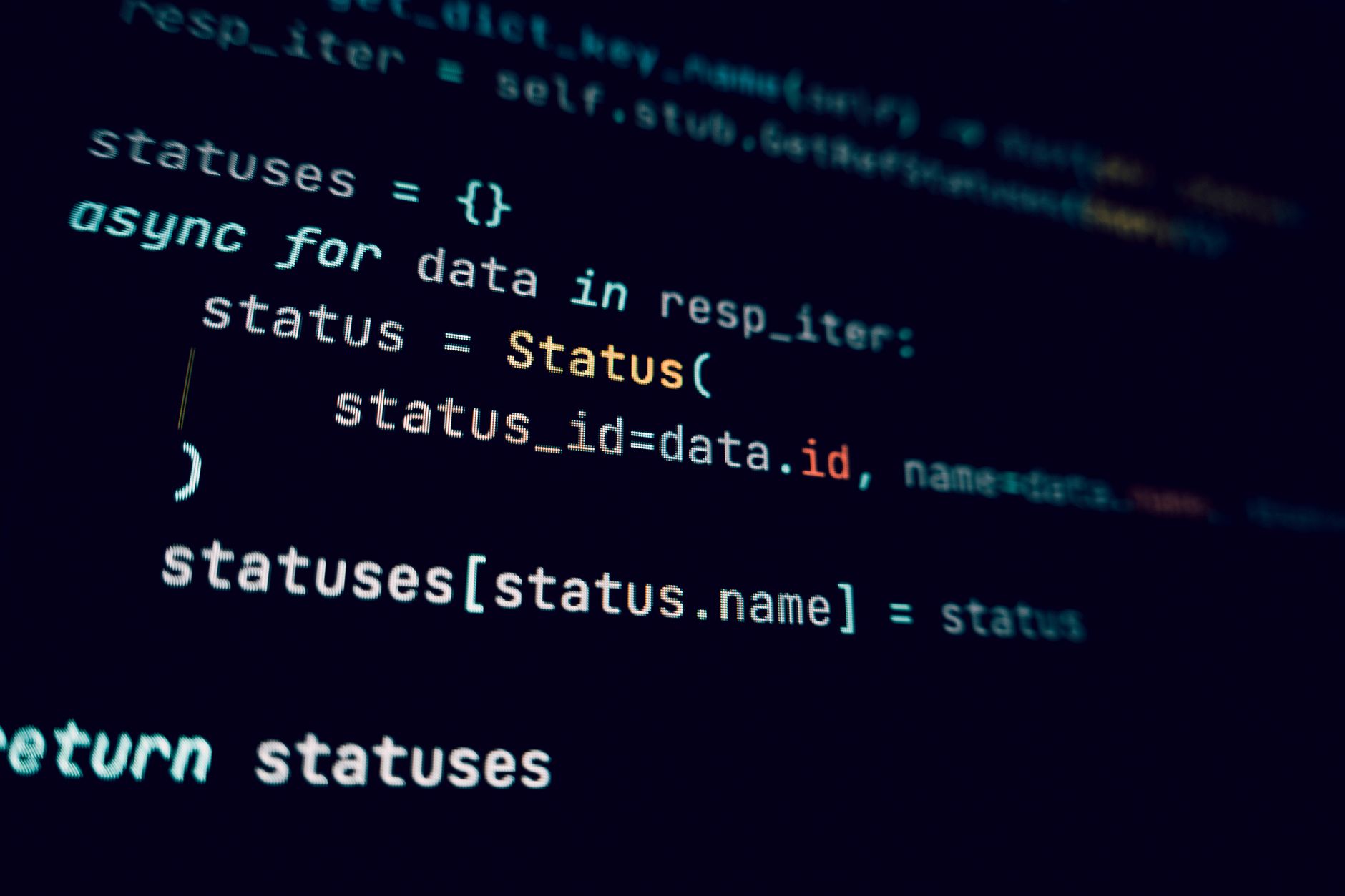 Detailed view of programming code in a dark theme on a computer screen — UPI Study