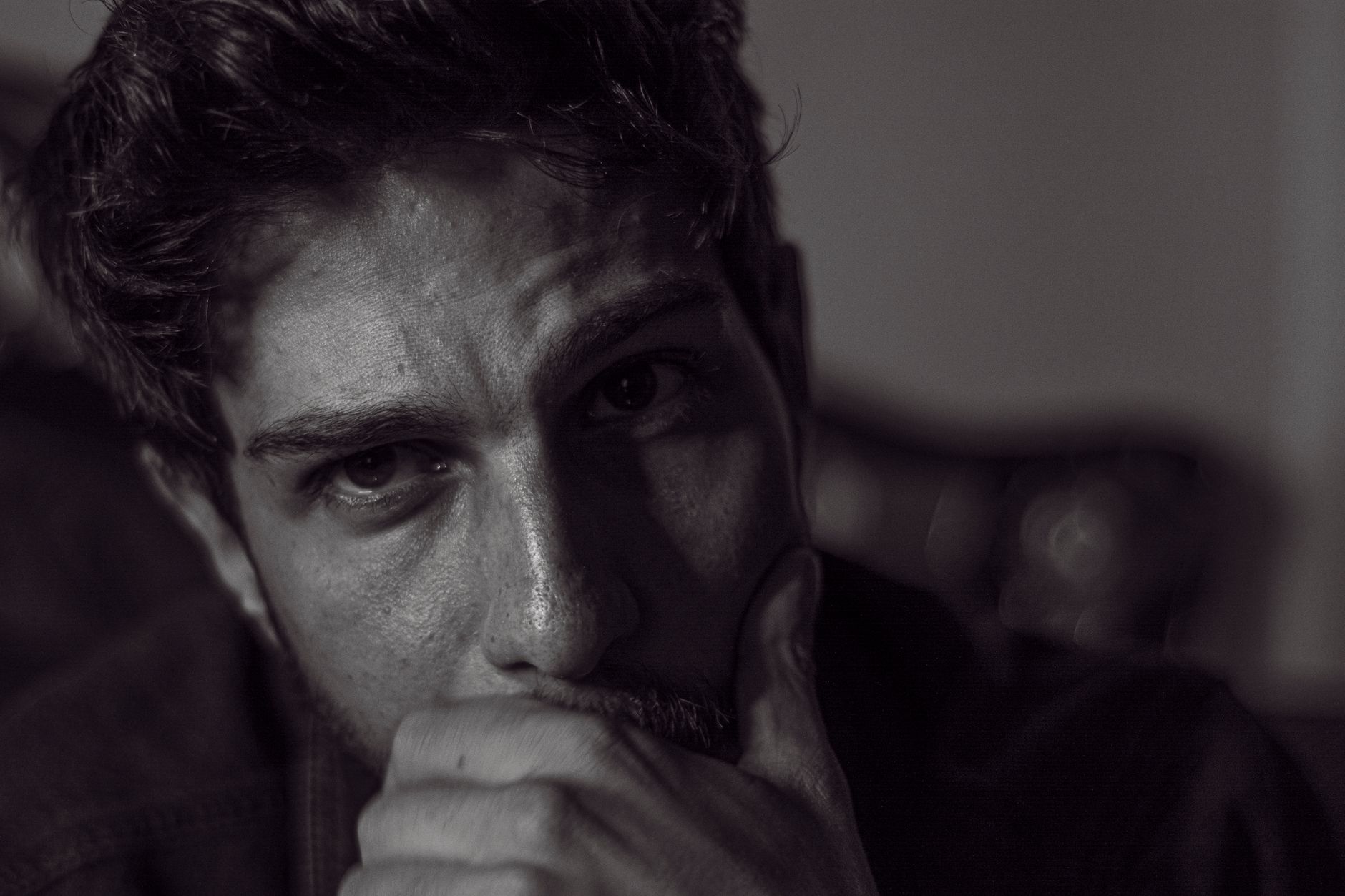 Expressive black and white portrait capturing deep thought and emotion — UPI Study